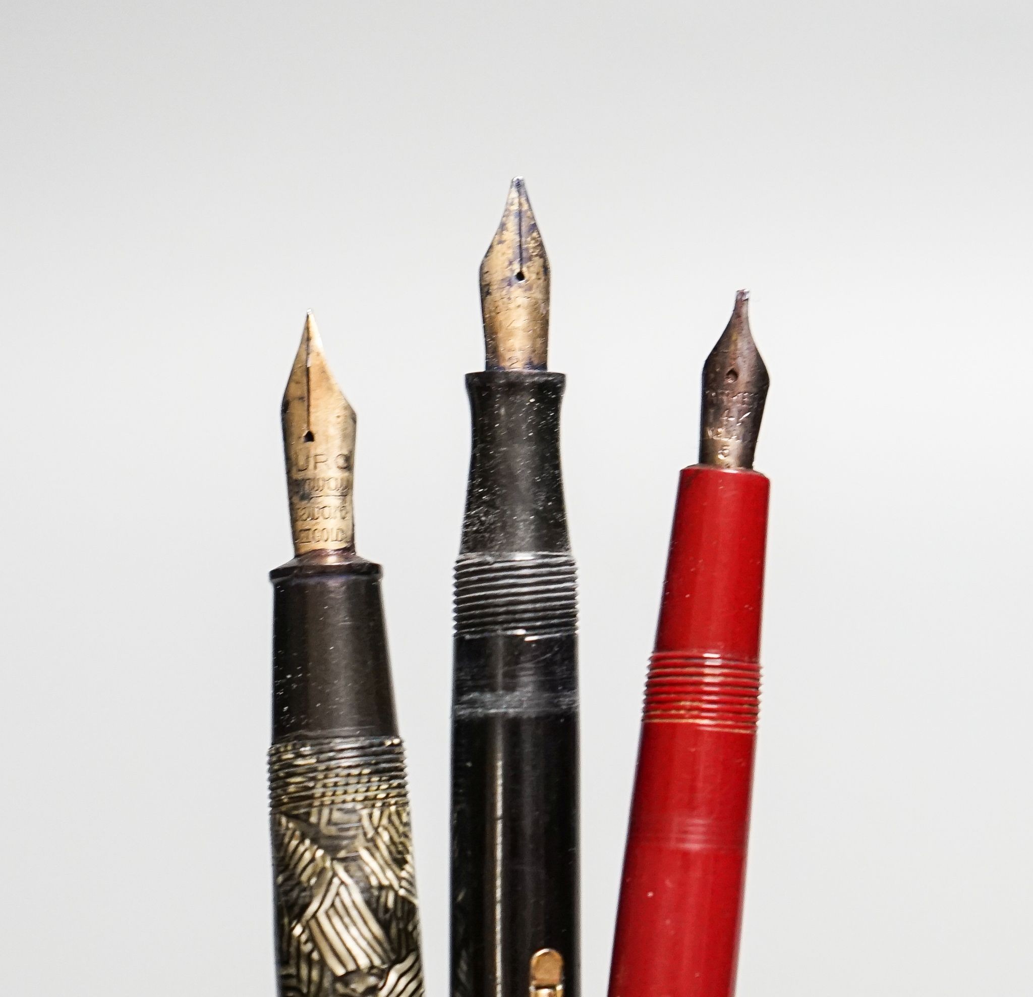 Three pens including 2 gold nibs, Waterman and Parker